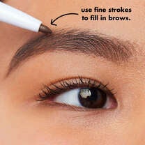 Model Applying Eyebrow Pencil