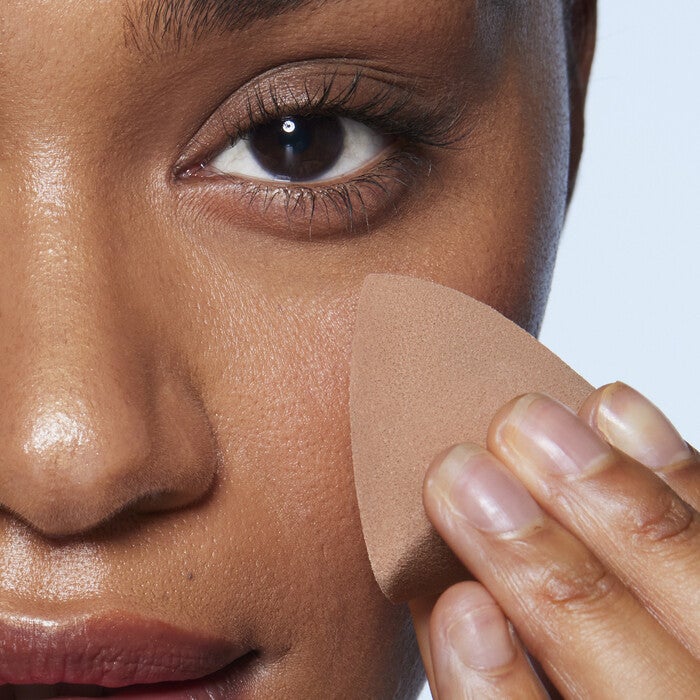 Applying Makeup Using Beauty Sponge