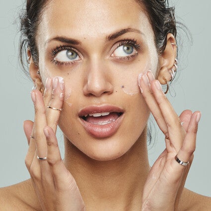 Applying Face Cream