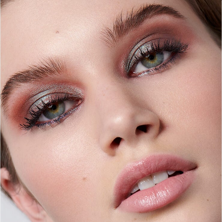 Models with different eyeshadow shades on